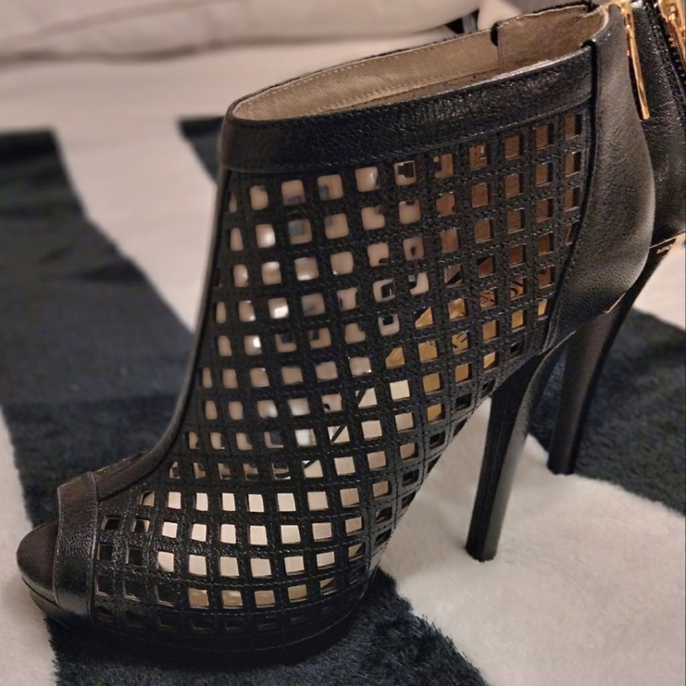 Michael Kors patent leather, laser cut heels